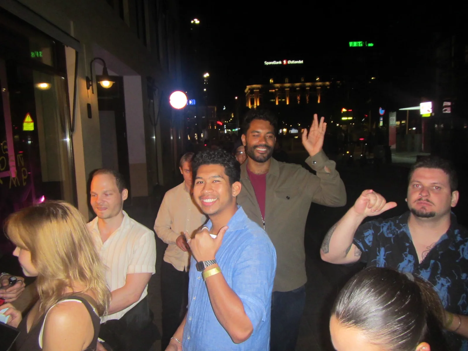 Guests celebrating together outside between bar stops